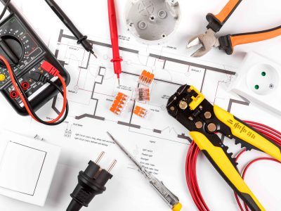 electrical tools and equipment on circuit diagram. top view